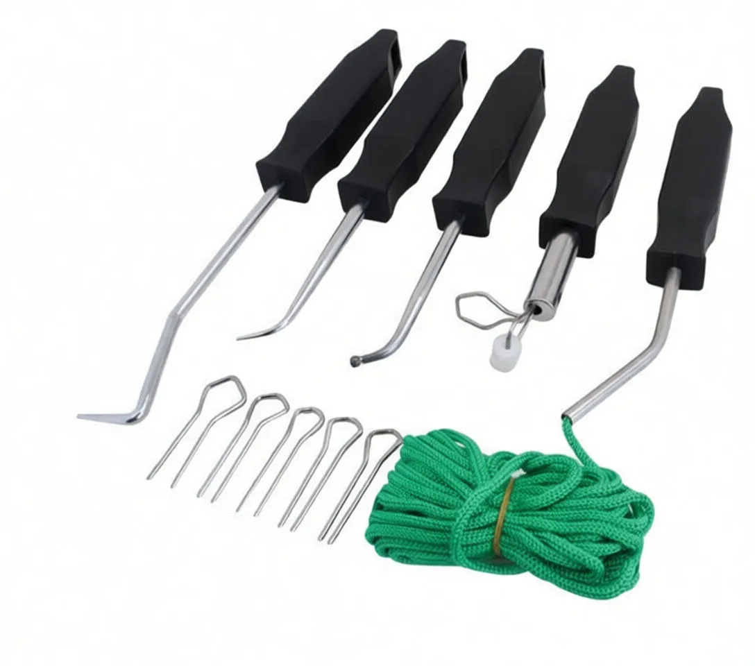 Top-down layout of five windscreen installation tools with black handles, a green rope bundle and multiple U-shaped retaining pins on white background