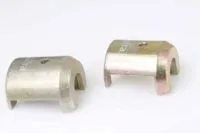 Two gold/zinc-plated U-shaped wiper arm adapter cups shown side by side