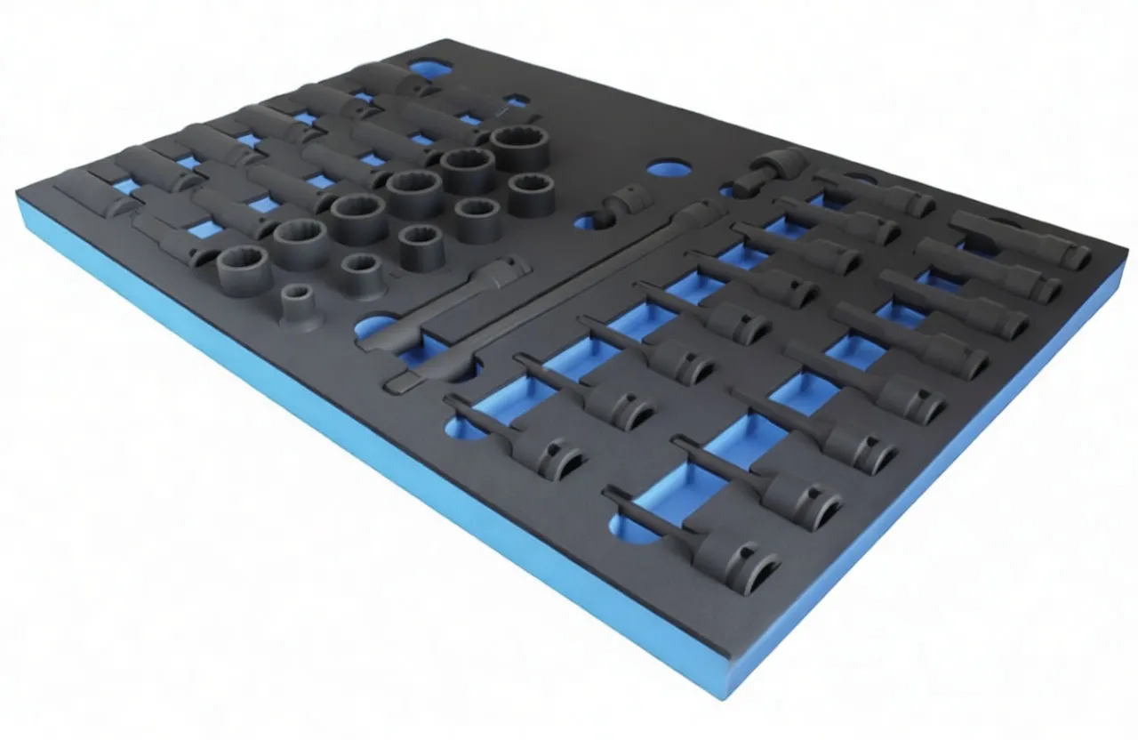 Angled view of black-and-blue foam tray loaded with black impact sockets, extensions and adapters, showing foam labeling and white size markings on tools.