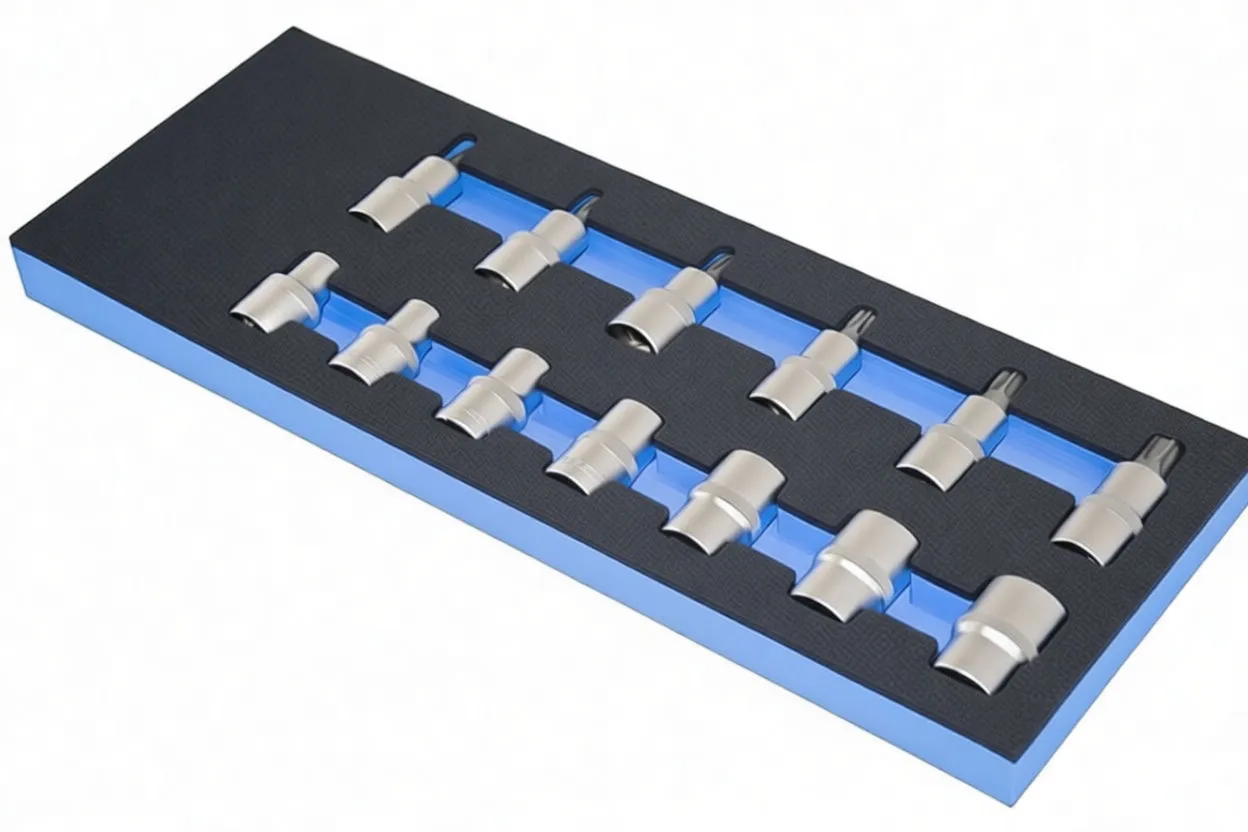 Angled view of black and blue foam tool tray with chrome Torx and E-series sockets, small star bits, adapter and visible ASTA logo and size labels.