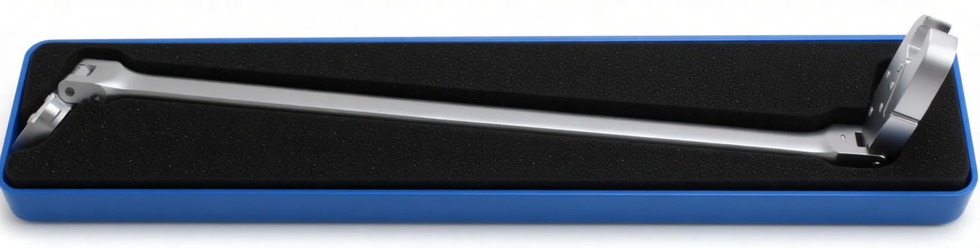 Macro view of wrench head showing curved outer plate, hinge pin and internal jaw